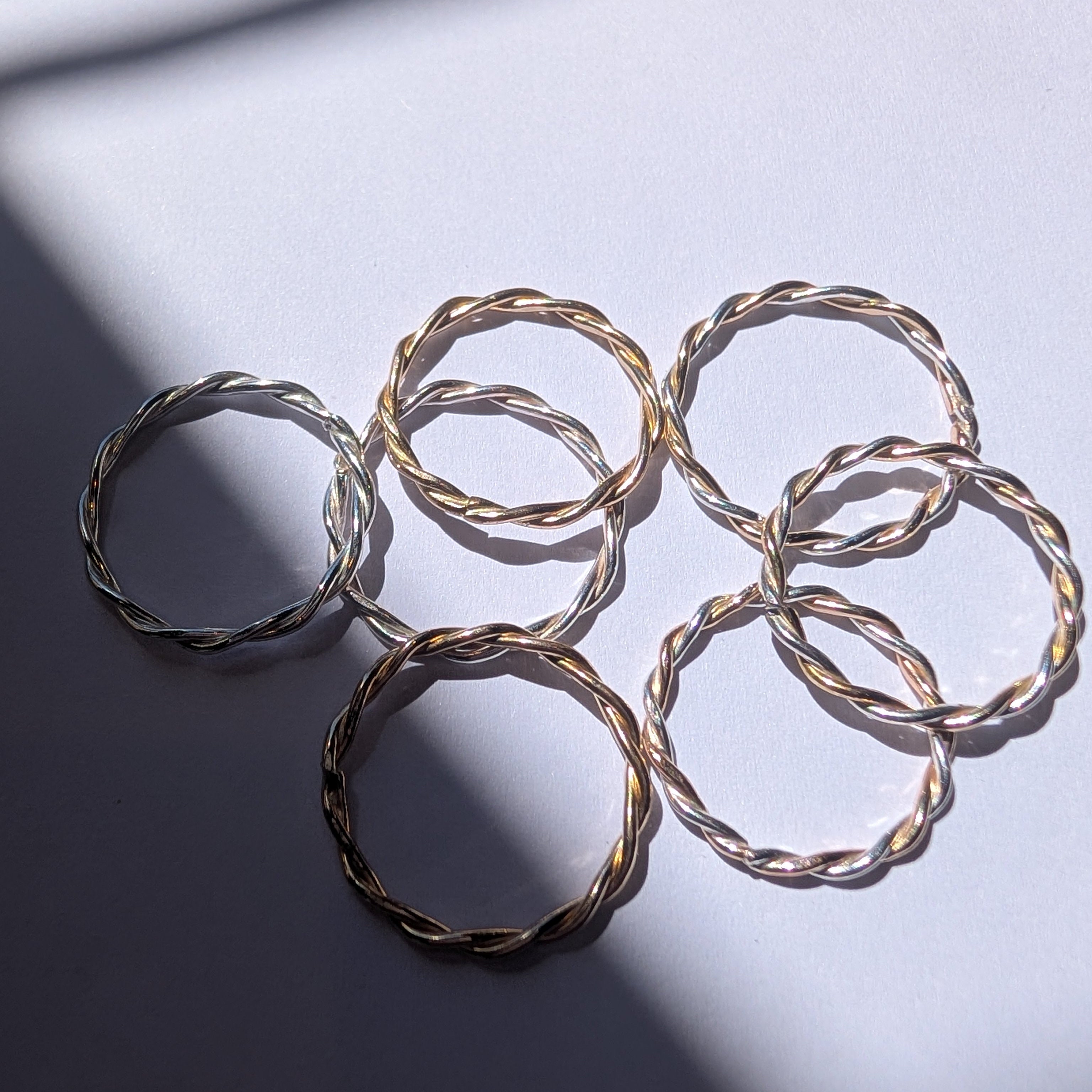 Skinny two tone twist stacker ring