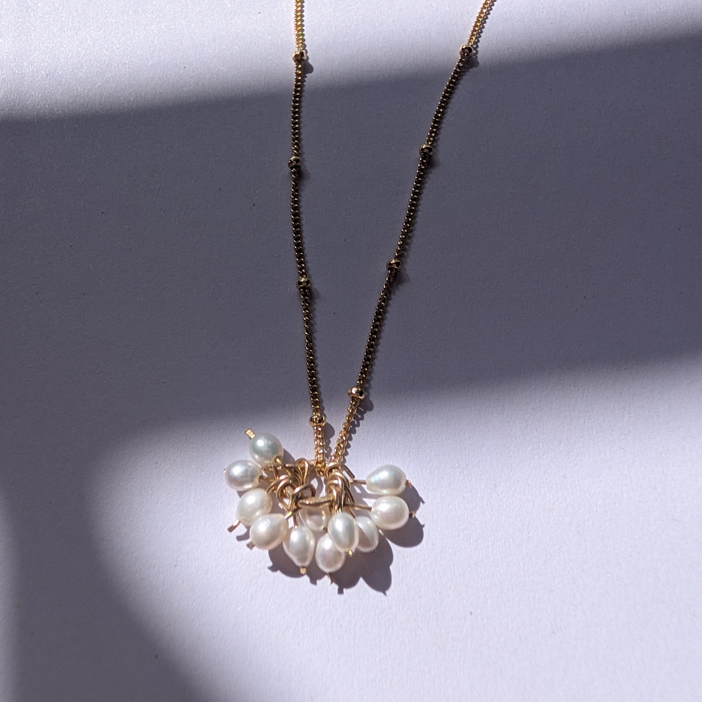 Pearl charm necklace