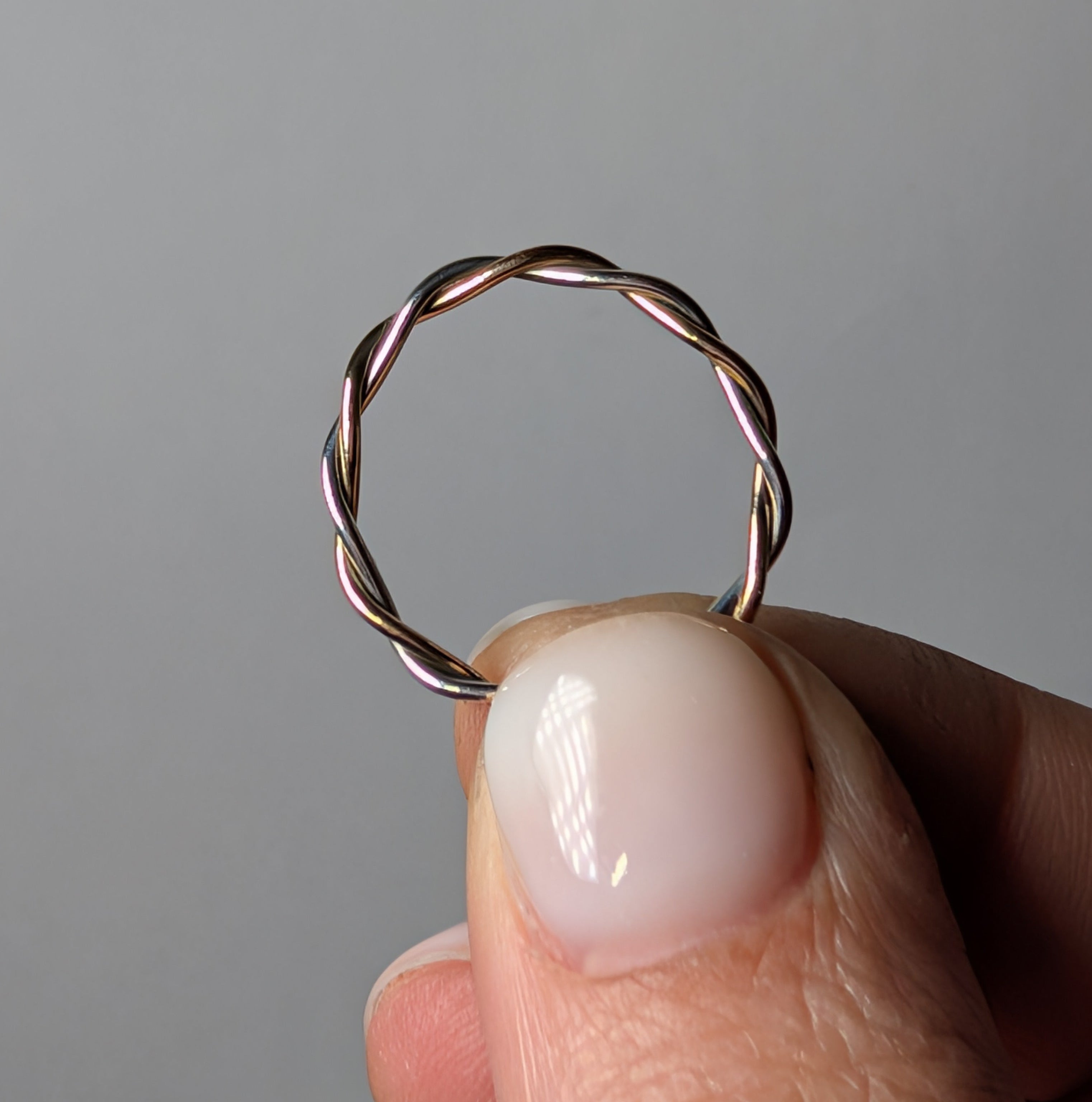 Skinny two tone twist stacker ring