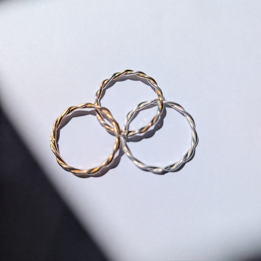 Skinny two tone twist stacker ring