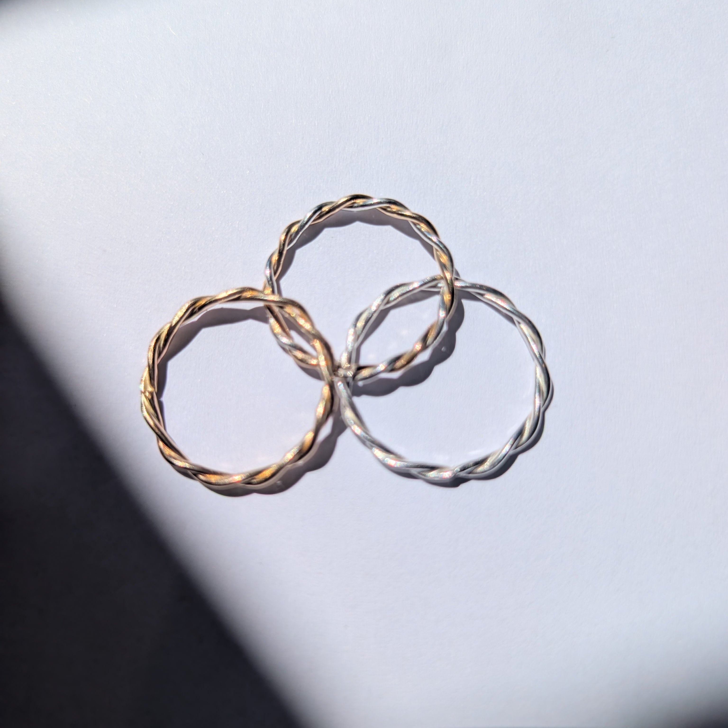 Skinny two tone twist stacker ring