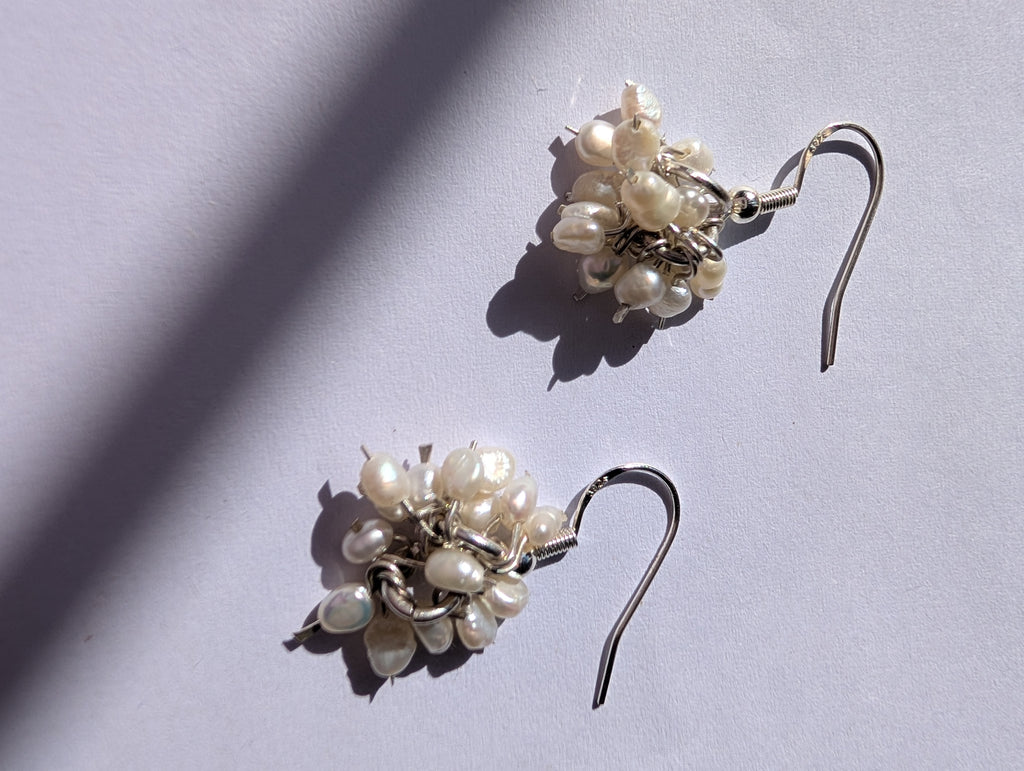 Pearl charm earrings