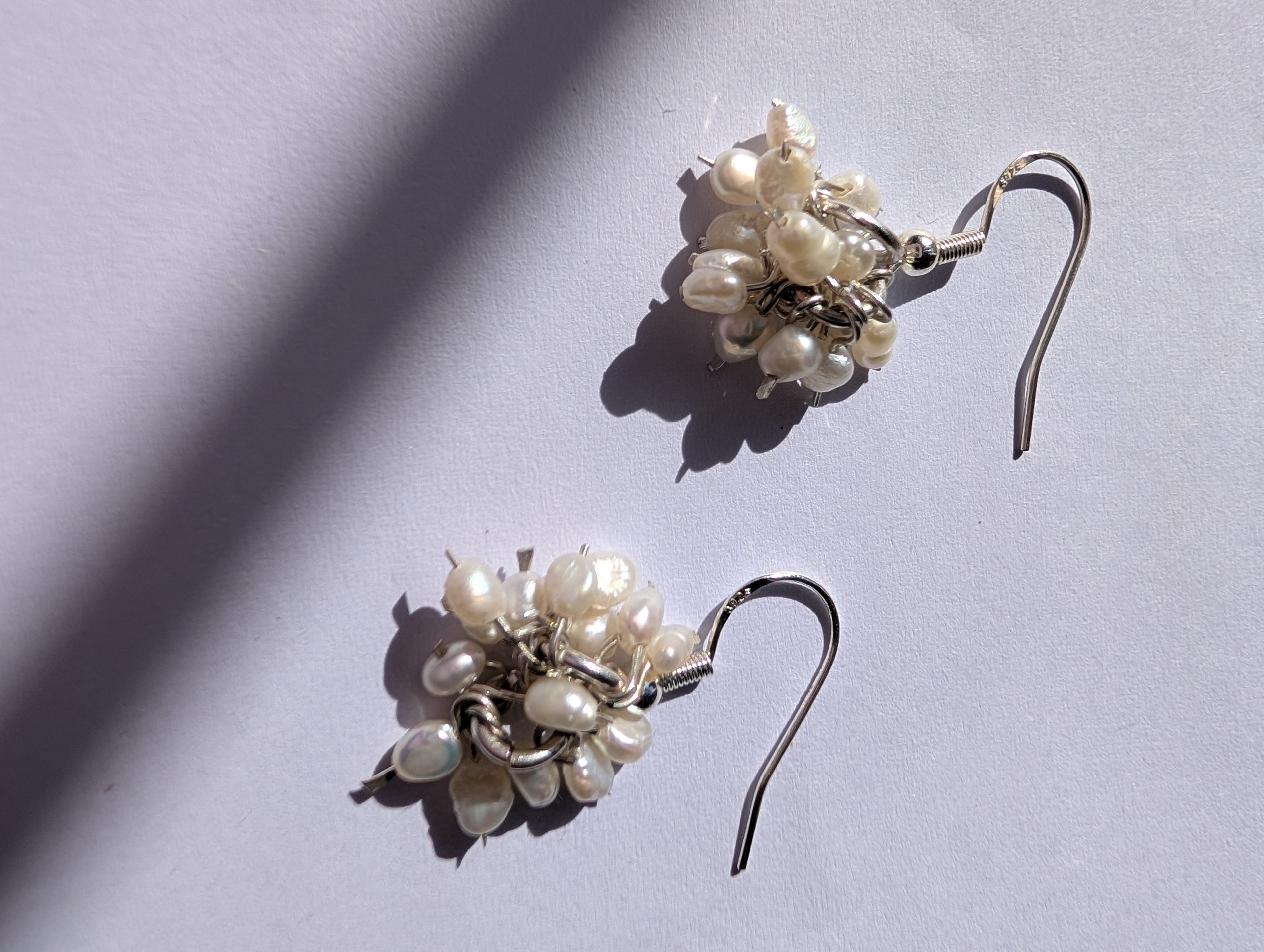 Pearl charm earrings