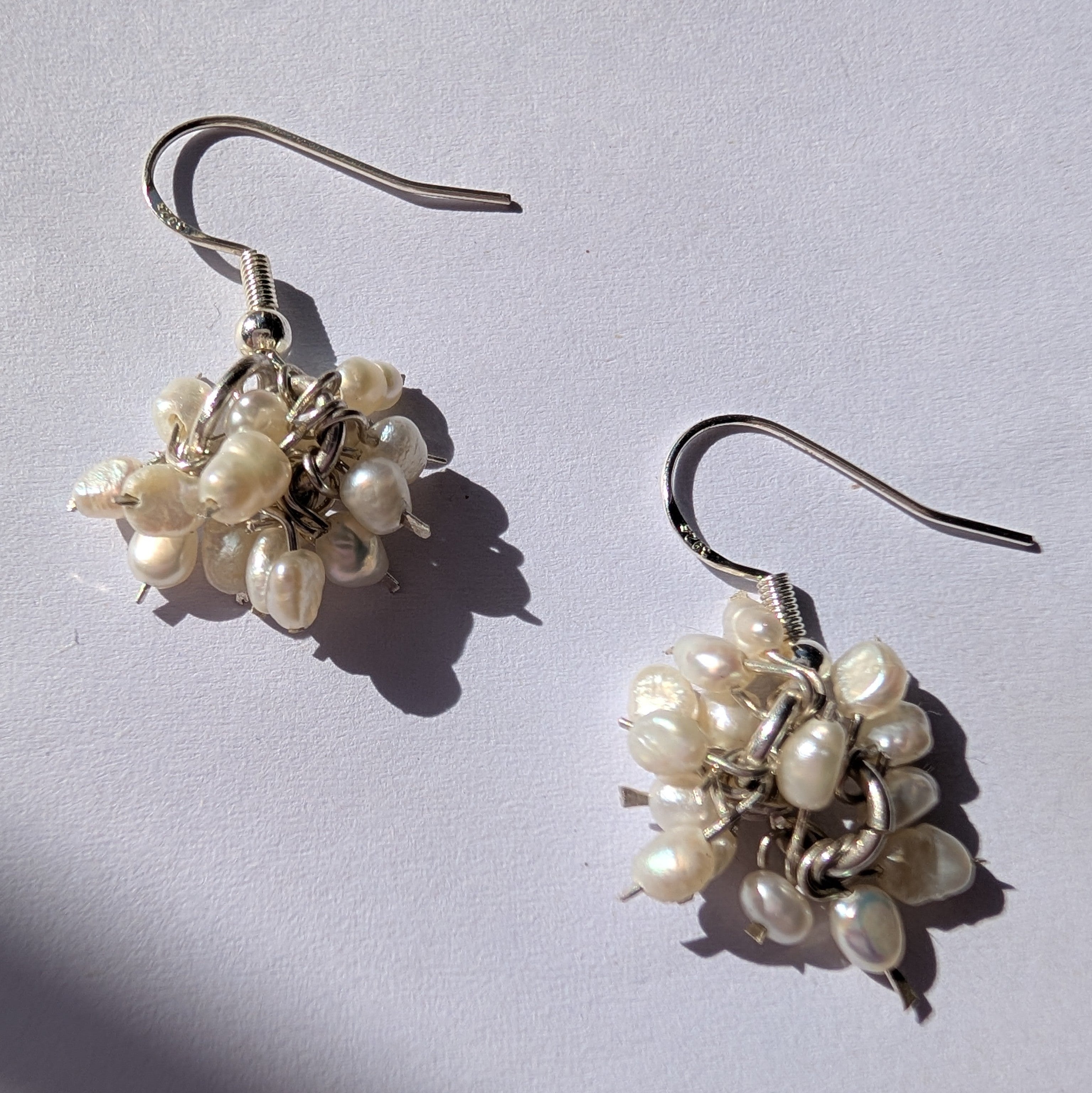 Pearl charm earrings