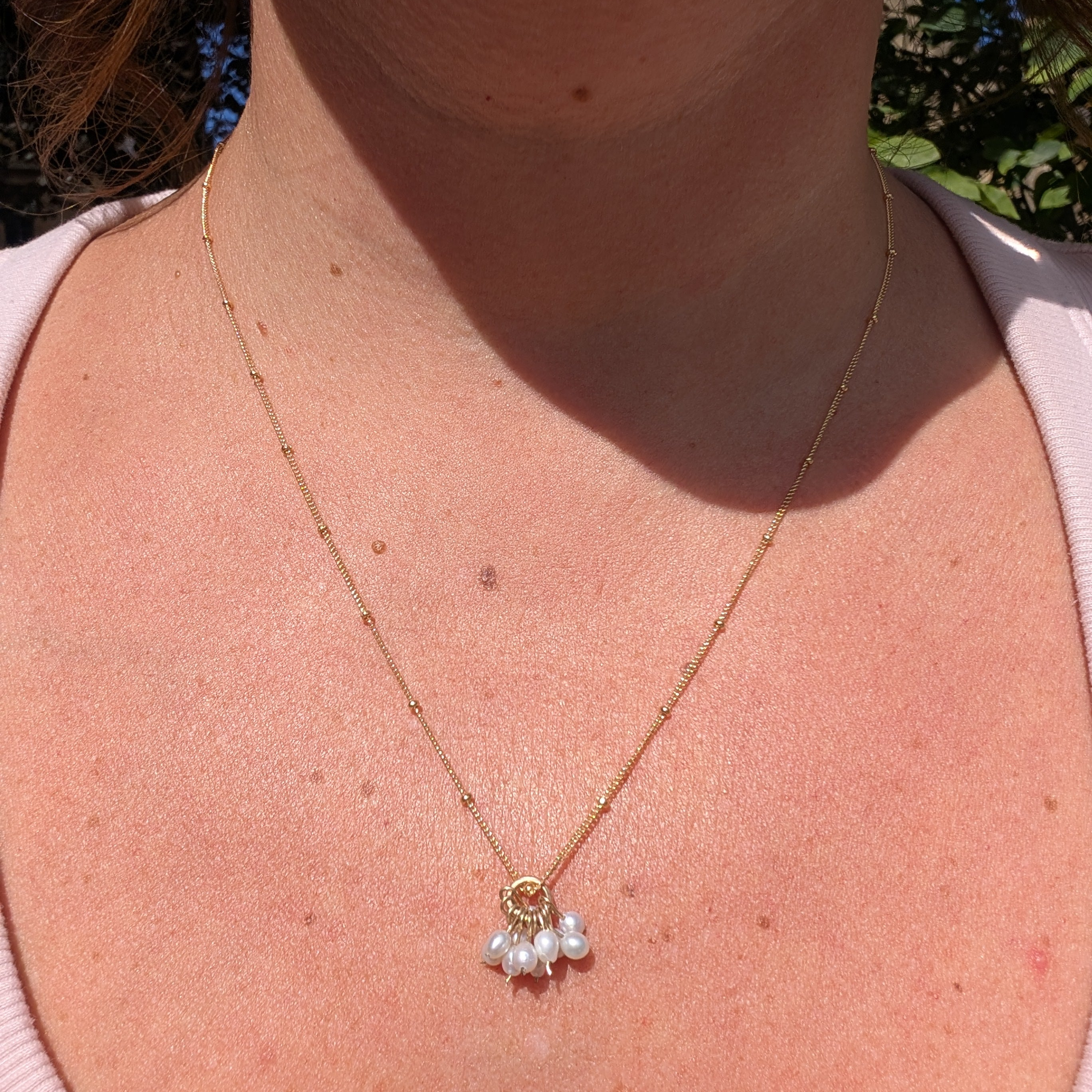 Pearl charm necklace