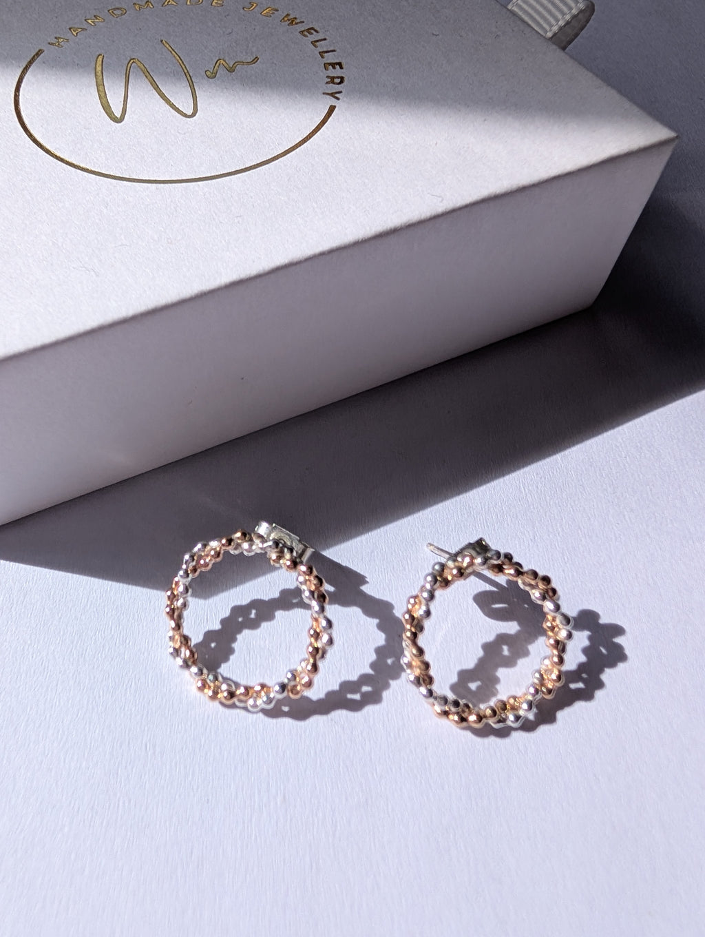 Lumin circle studs