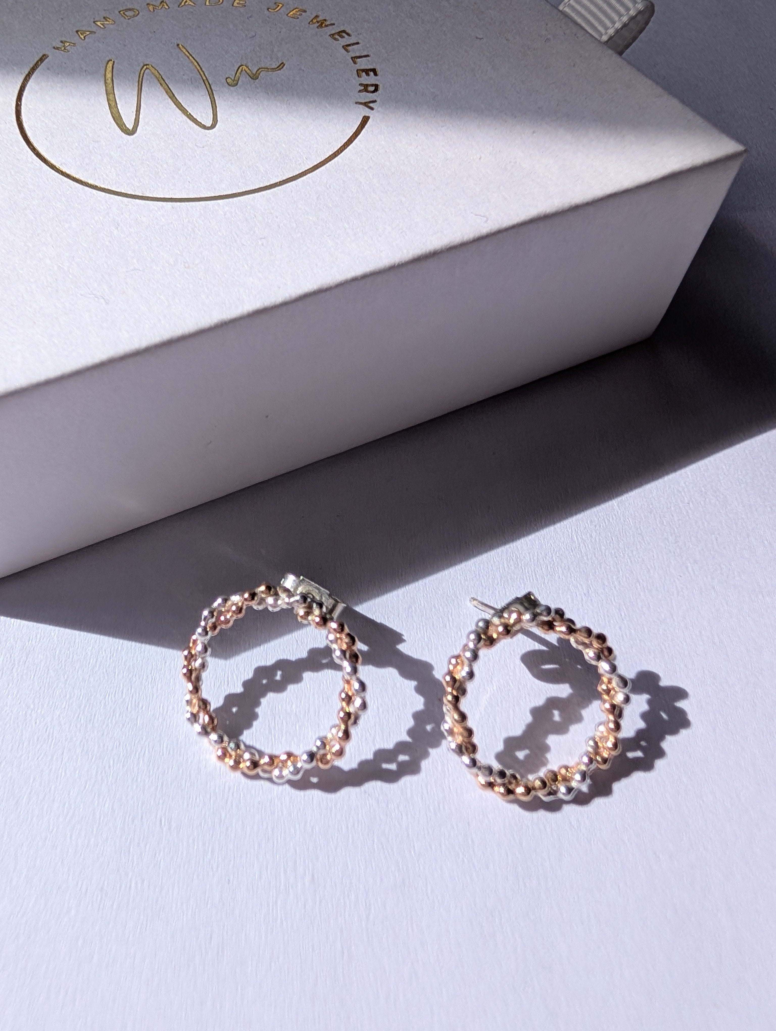 Lumin circle studs