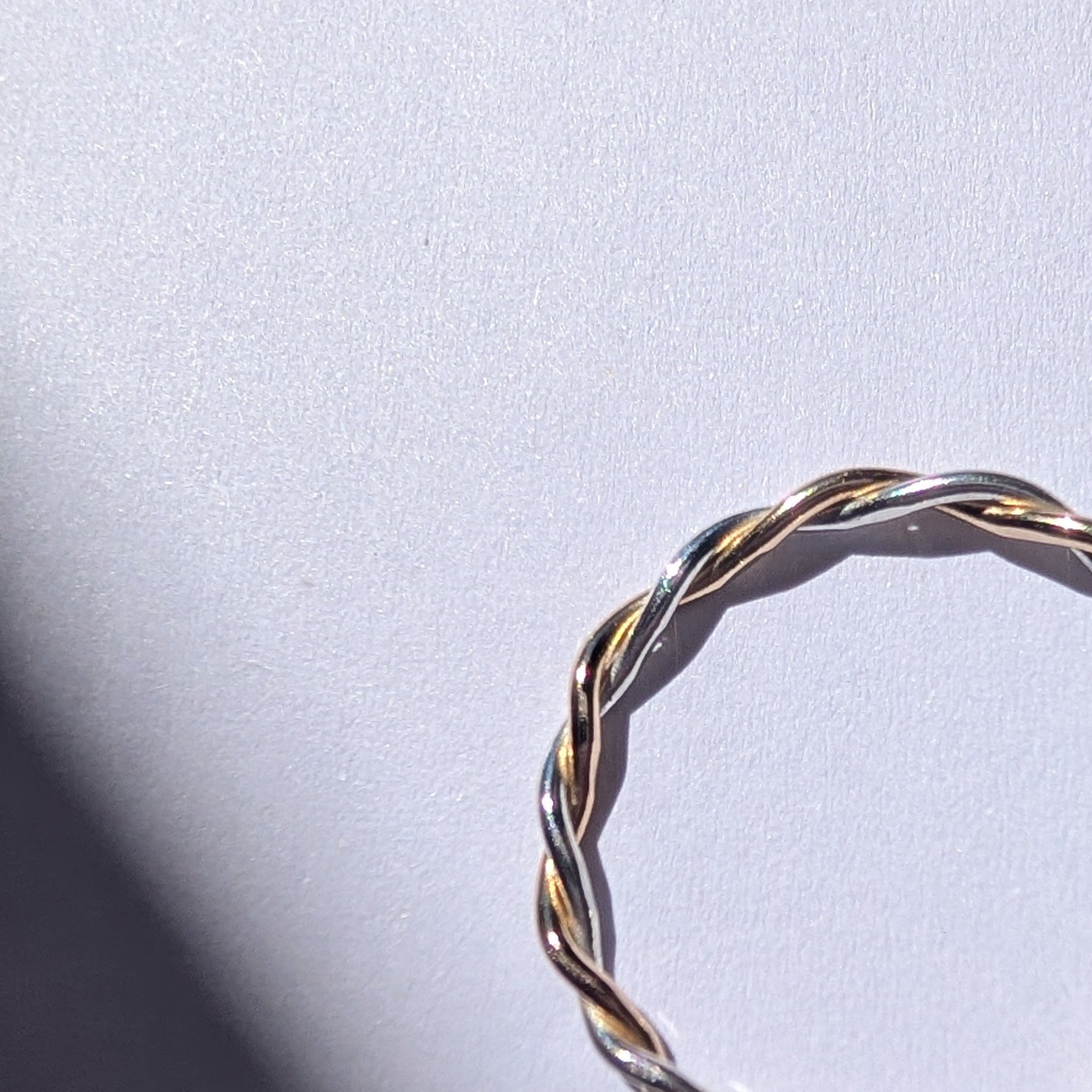 Skinny two tone twist stacker ring